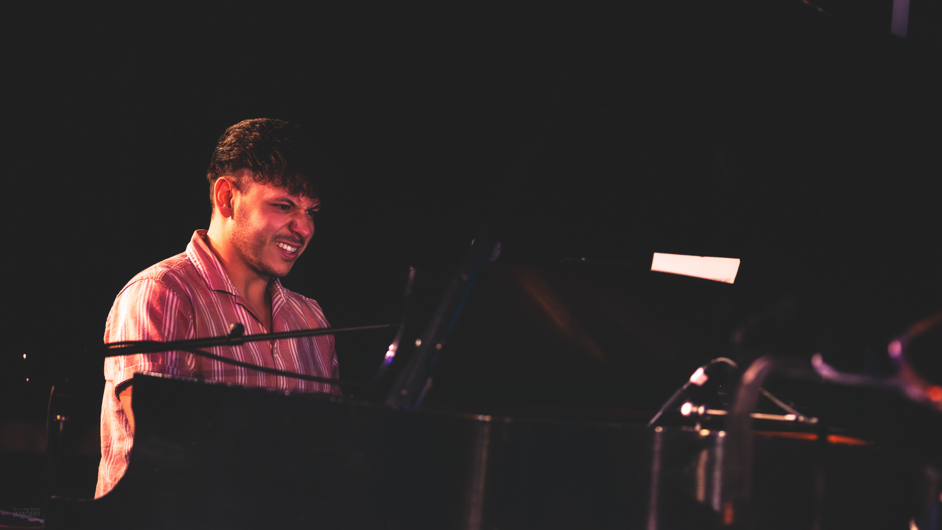 Chick Magnet performing a polished set under stage lighting